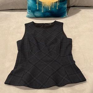 Plaid sleeveless shell for work or a night out! Comfy polyester wool blend.